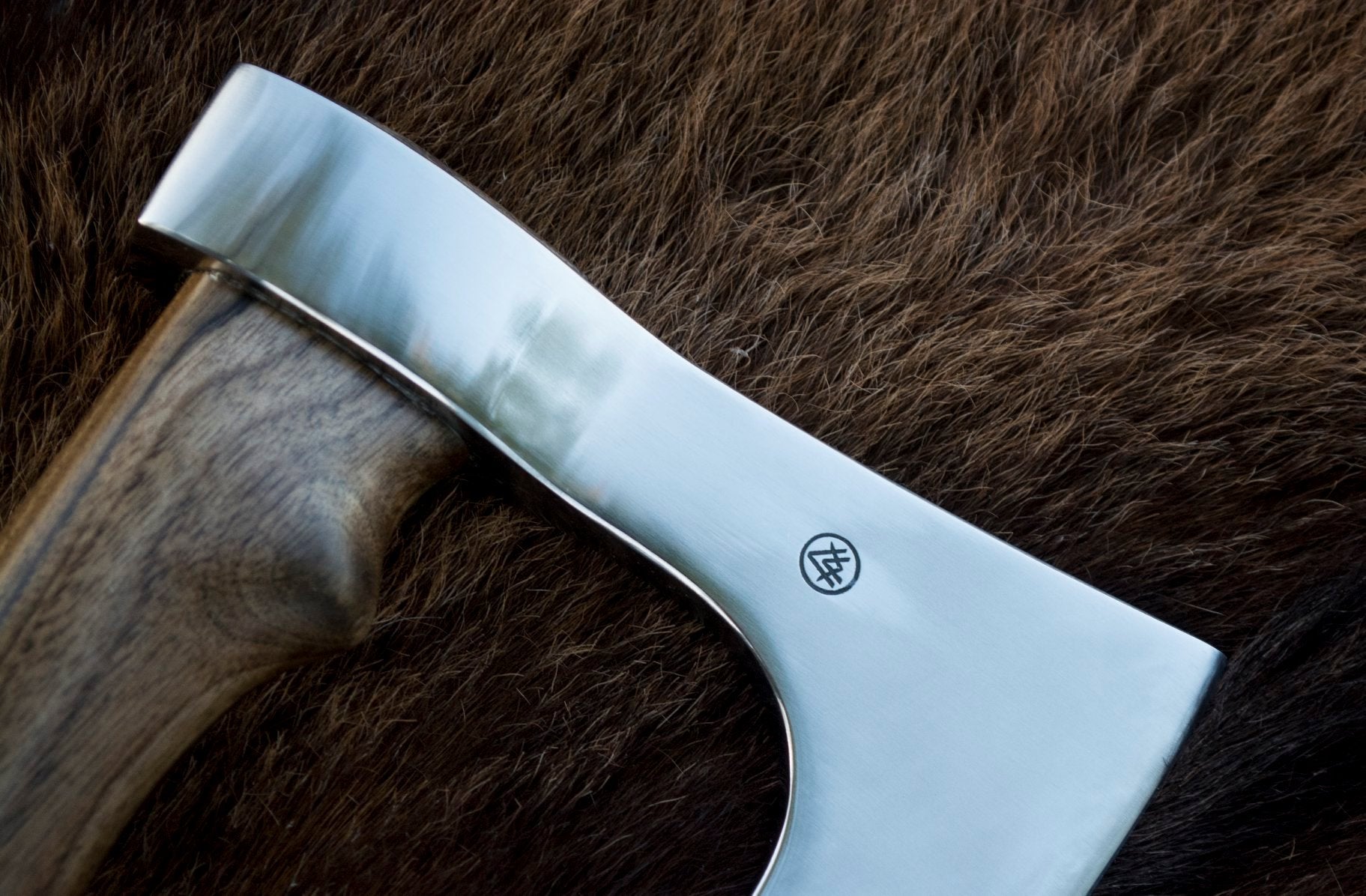 Polished axe head for sale
