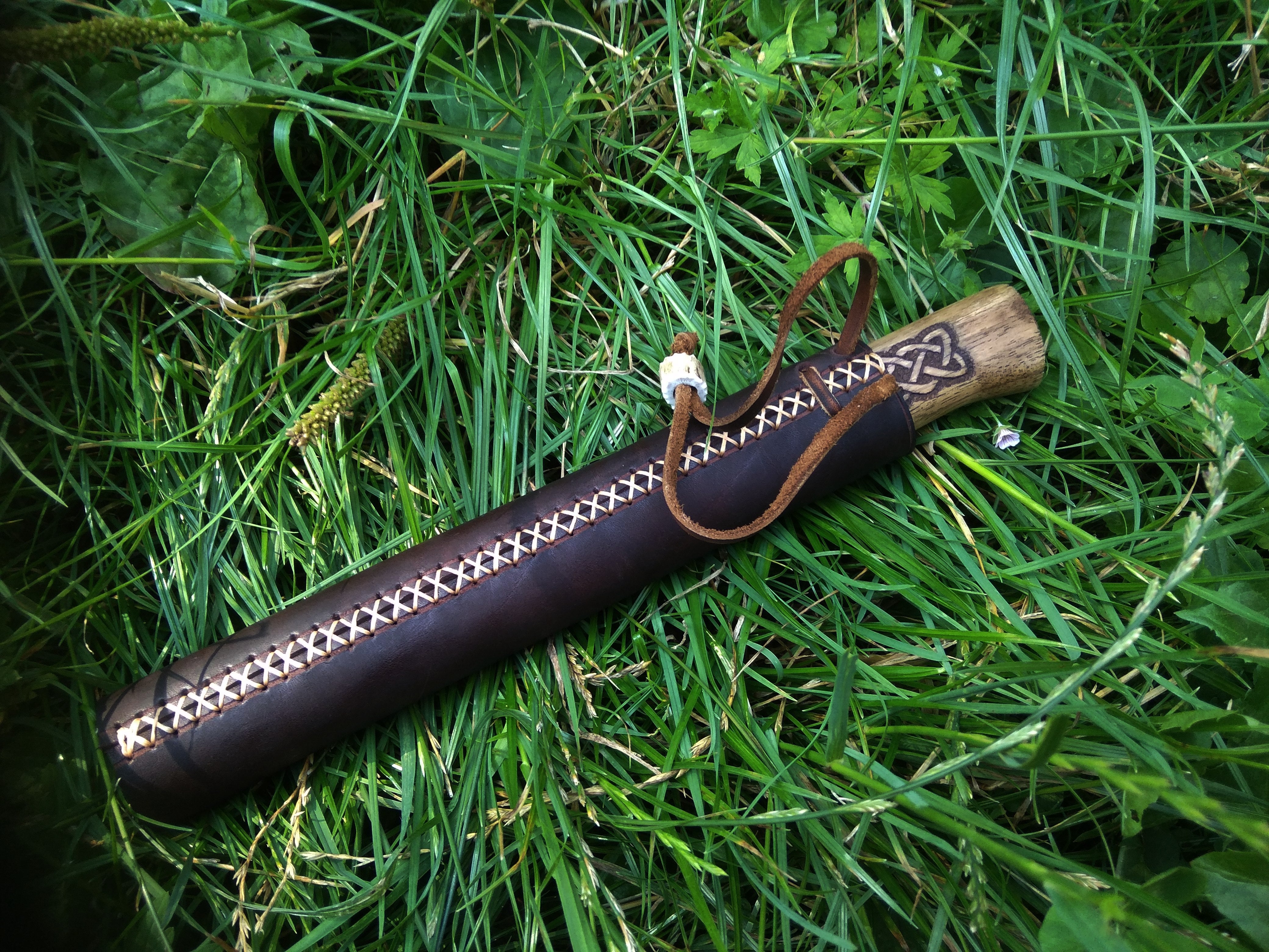Small knife with leather sheath