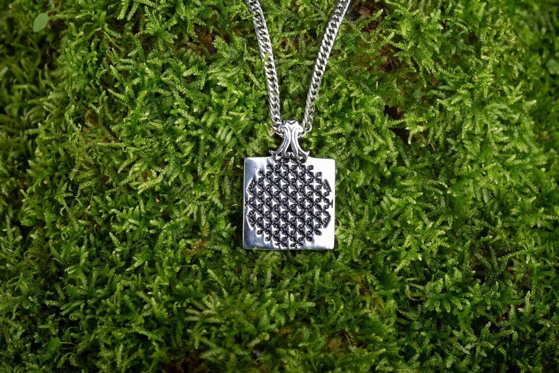 Sun god pendant