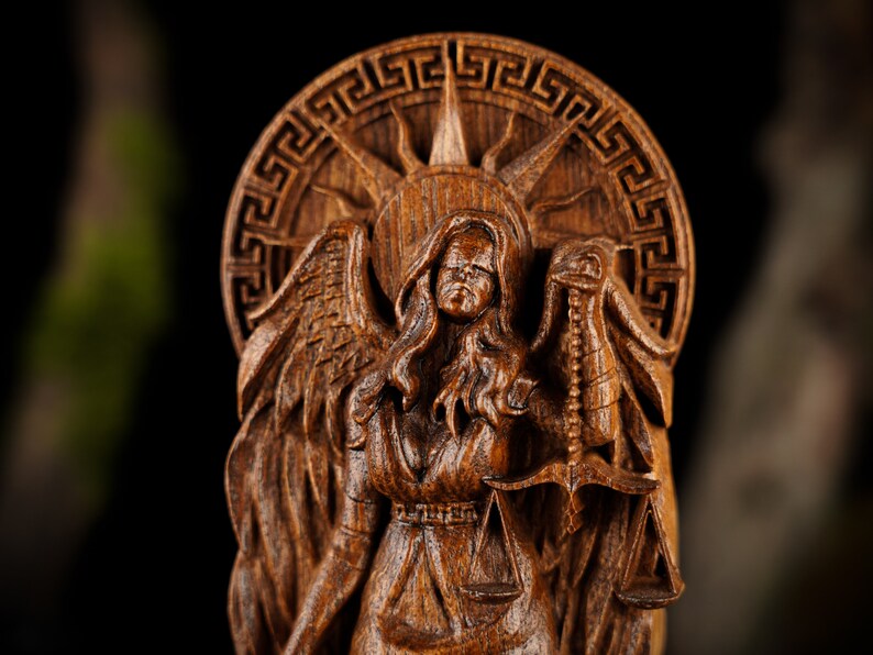 Nemesis goddess statue