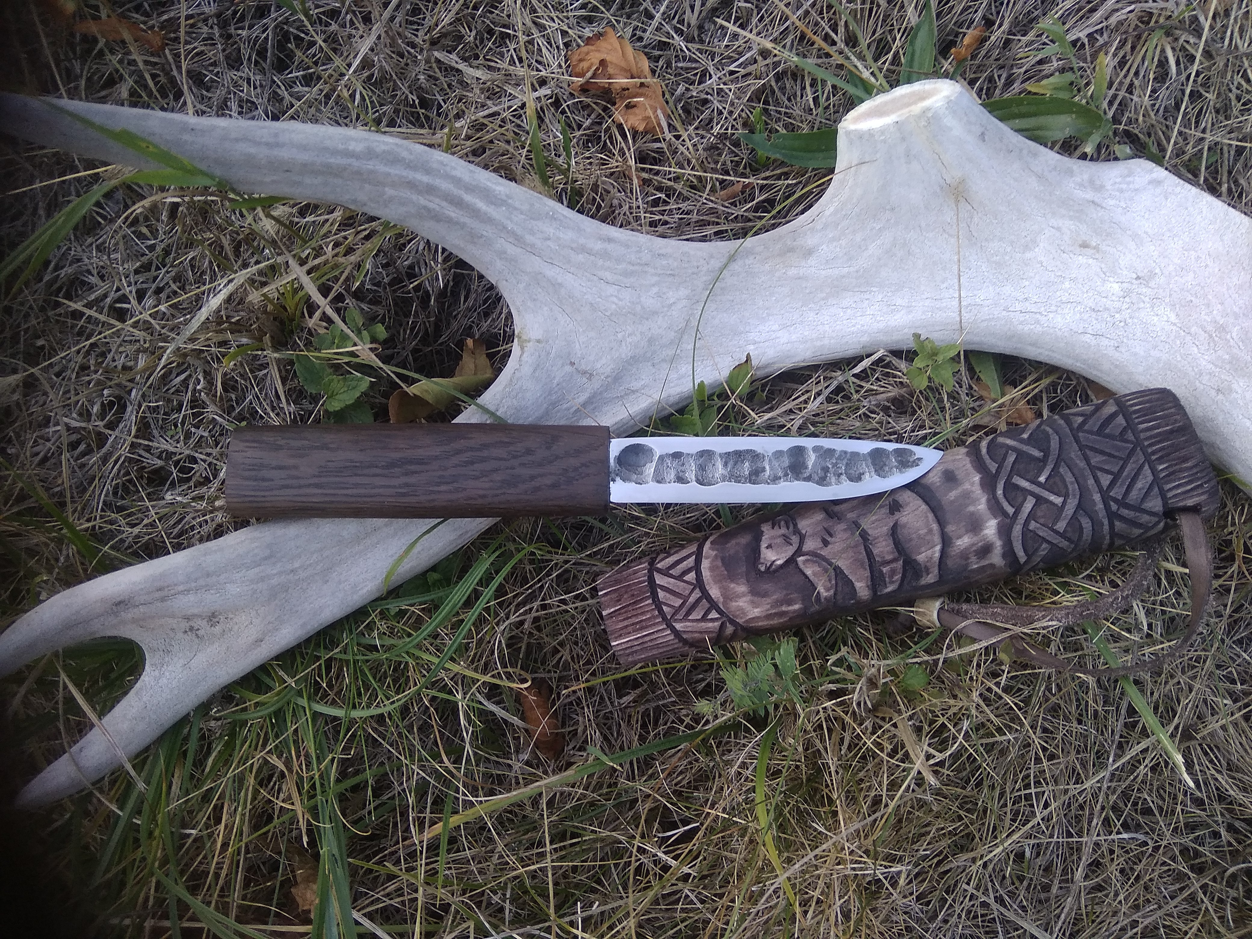 Small knife with wooden sheath