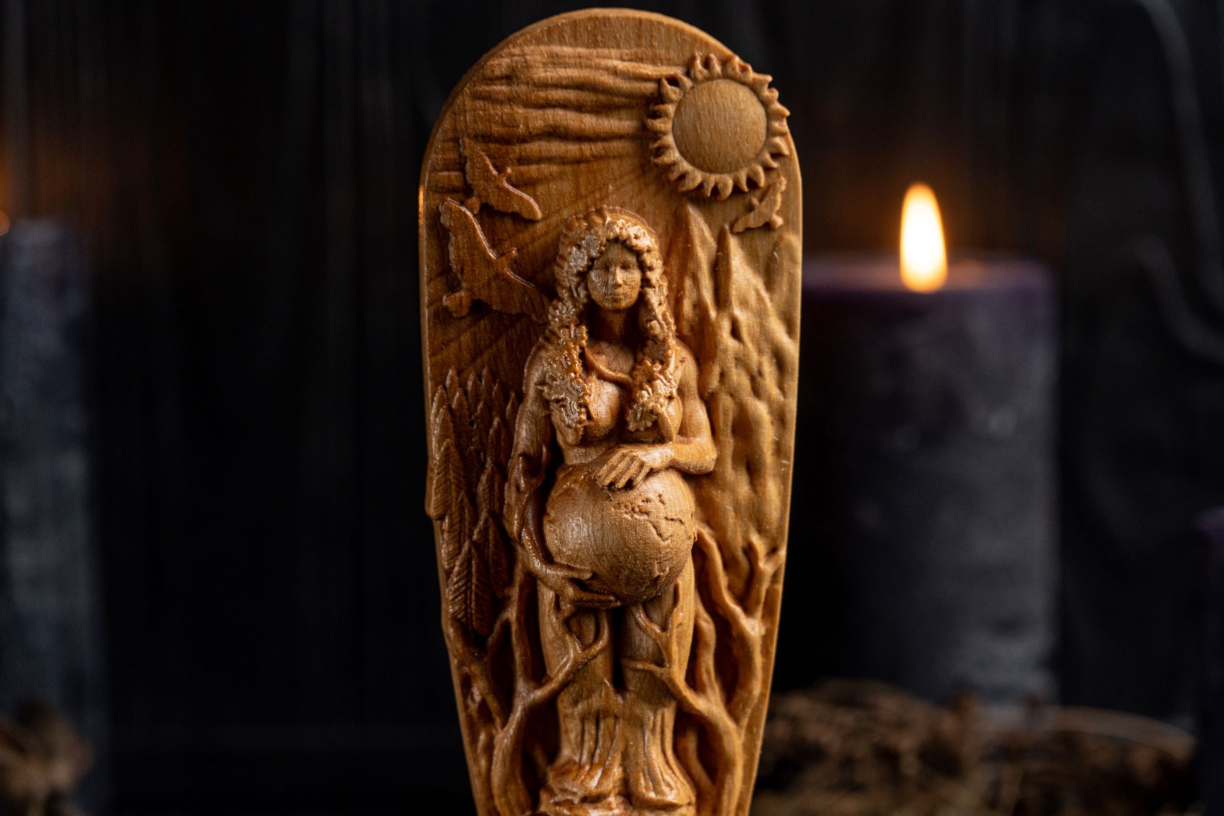 Hand carved gaia figurine