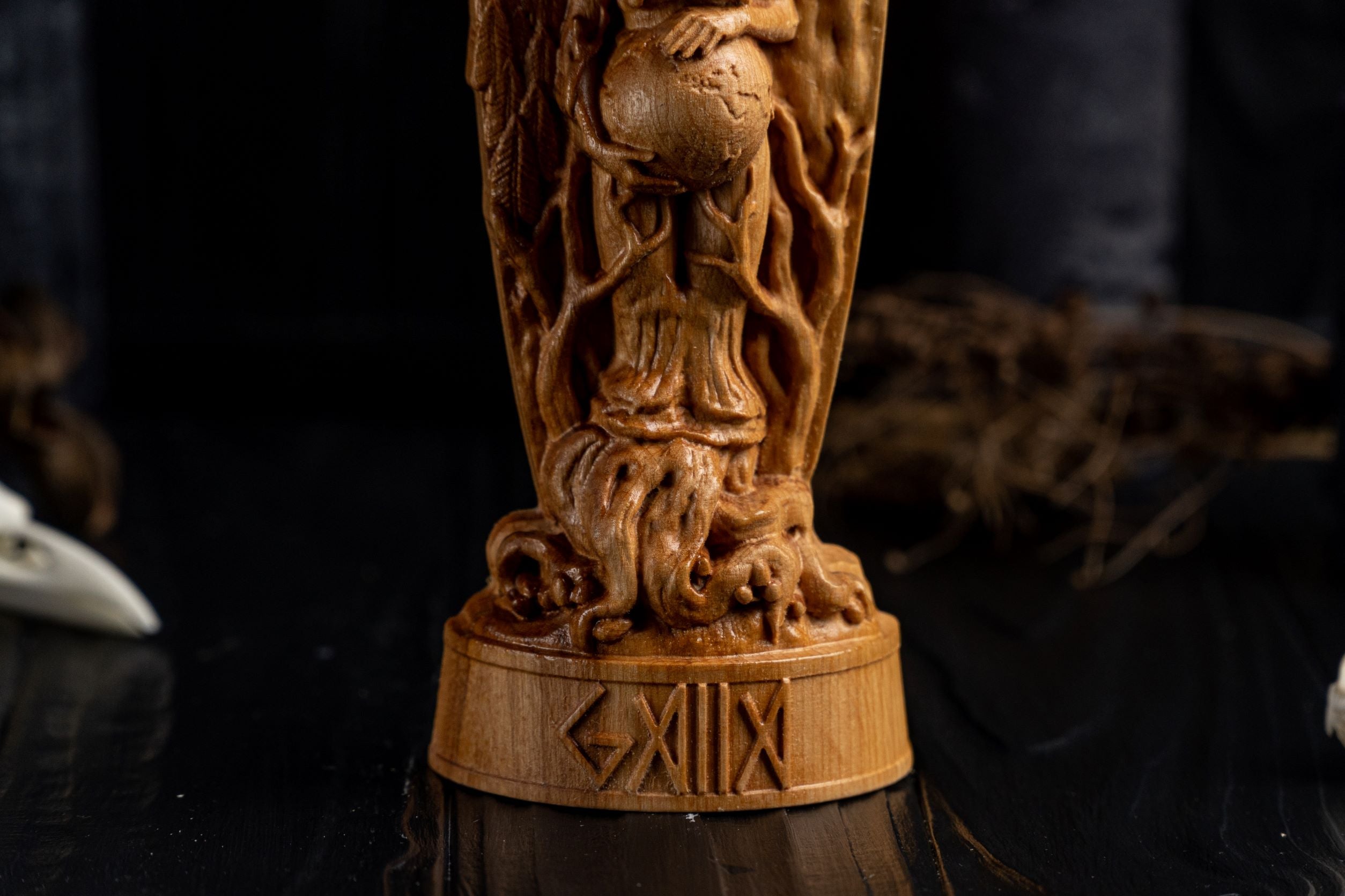 Wooden gaia figurine